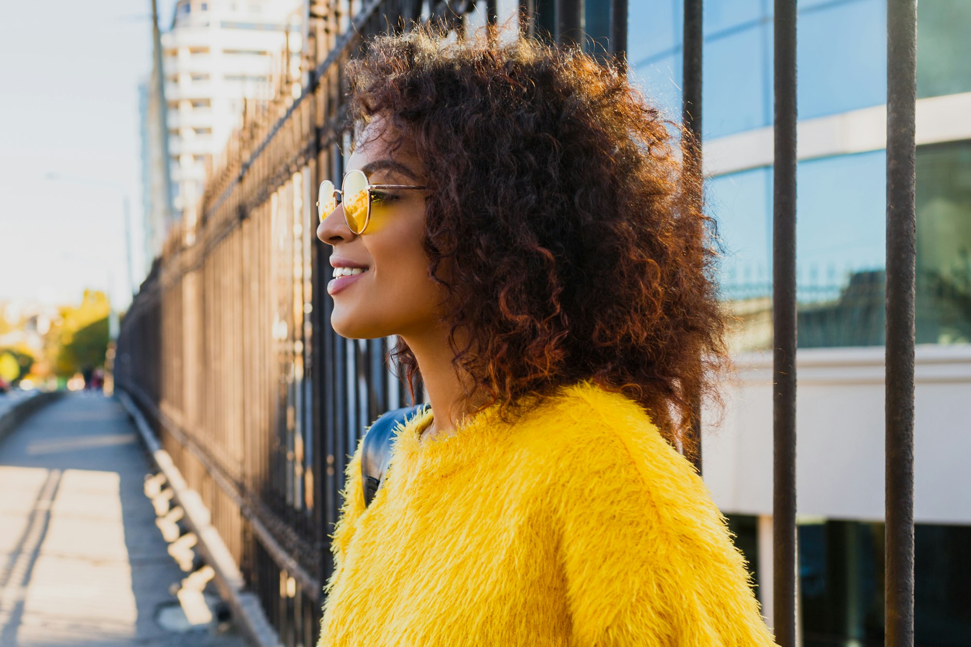 happy black female with stylish hairstyle